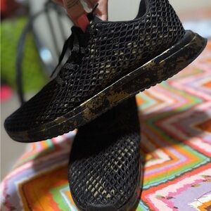 Black and Gold Mesh NO BULL running shoes